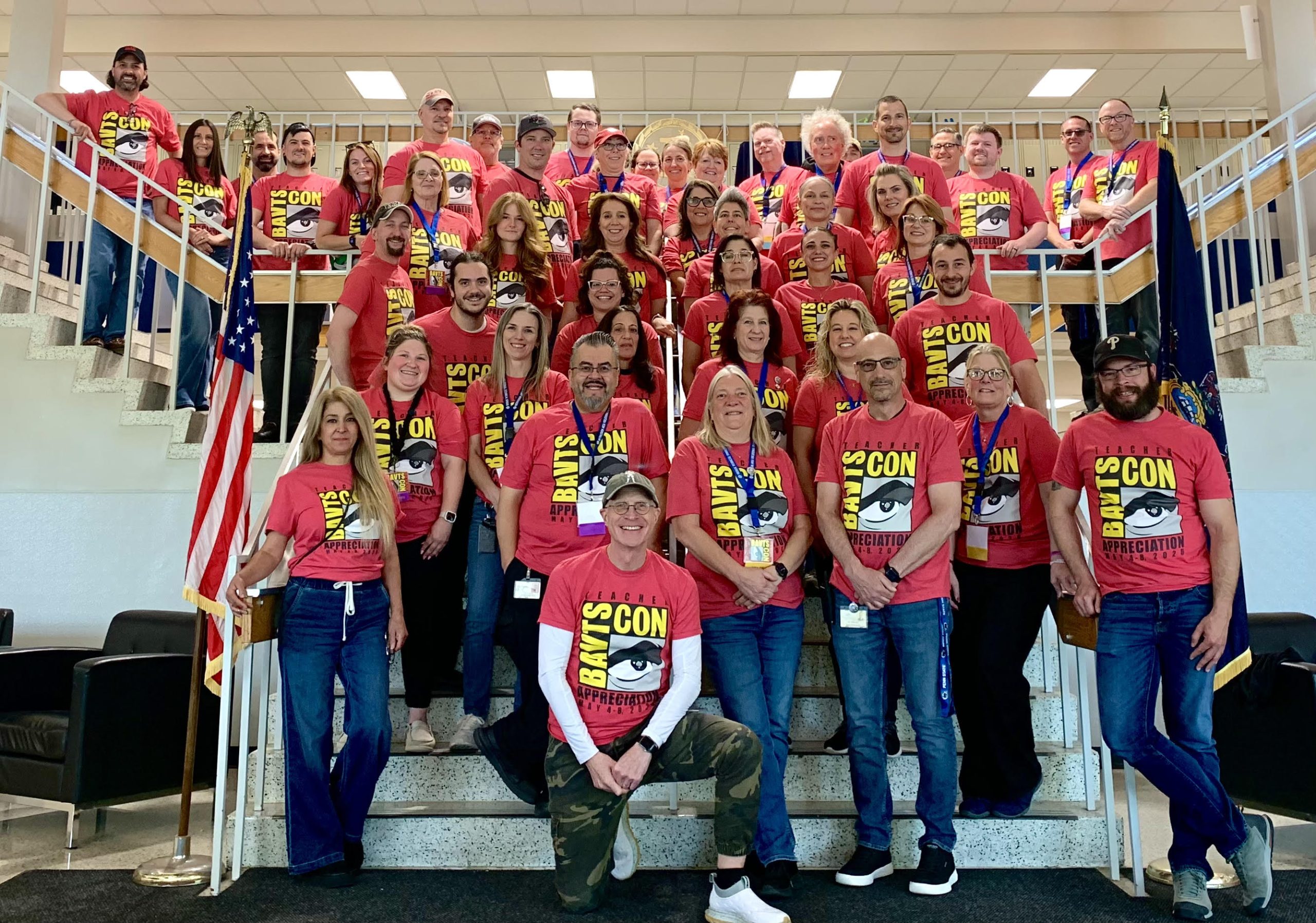 Group photo of BAVTS staff wearing BAVTS CON t-shirts